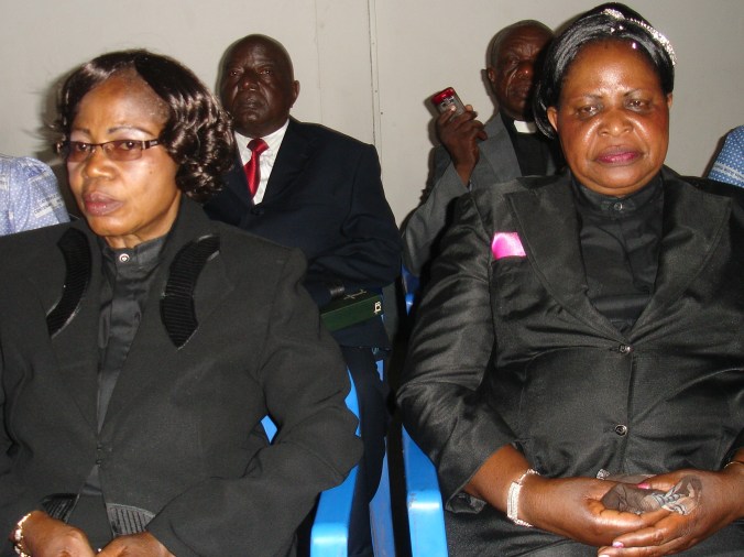 Ordination candidates Ngombe and Swana, backed by their husbands